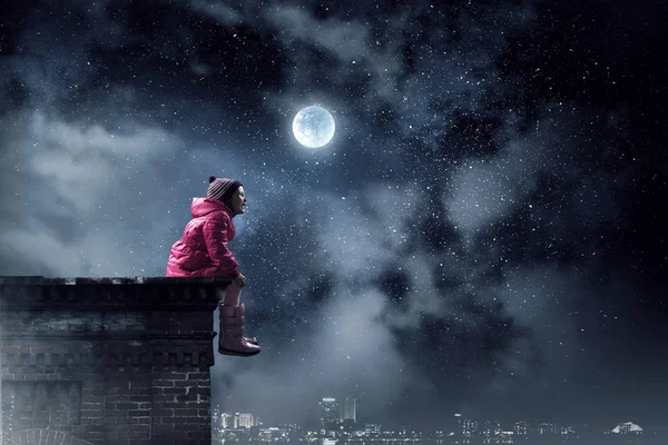 Child dreaming alone. Mixed media — Stock Photo, Image