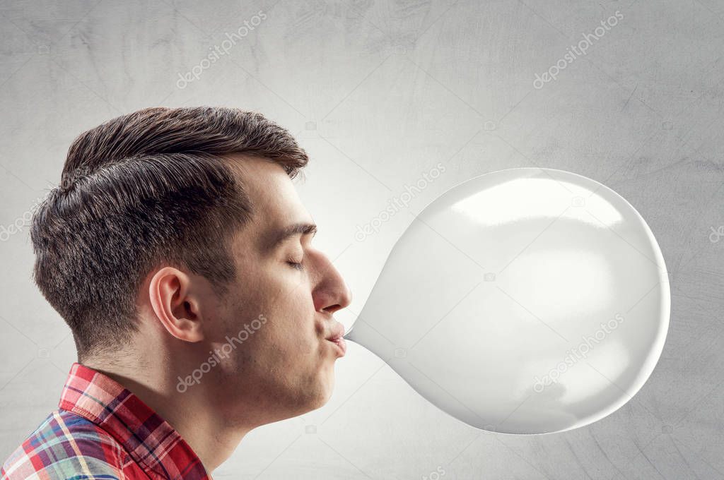 Guy blowing bubble . Mixed media