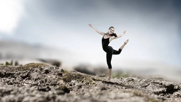 Gymnast girl in jump Смешанные медиа — стоковое фото