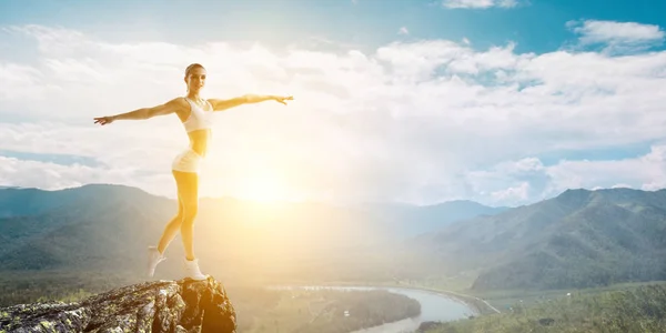 Athlete woman outdoors. Mixed media — Stock Photo, Image