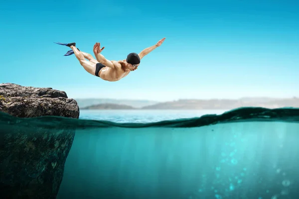 Swimmer in jump. Mixed media — Stock Photo, Image