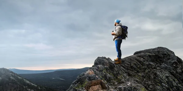 Hiker man in mountains. Mixed media — Stock Photo, Image