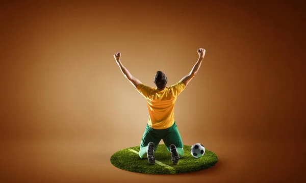 Soccer player on round pedestal. Mixed media — Stock Photo, Image