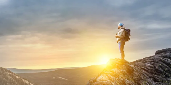 Hiker man in mountains. Mixed media — Stock Photo, Image