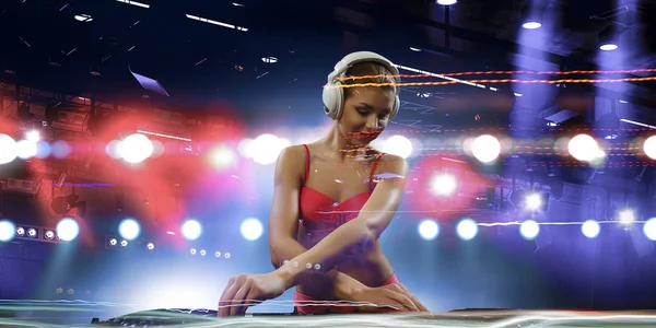 Cute dj woman at console. Mixed media — Stock Photo, Image