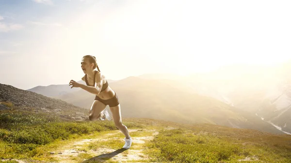 Sportswoman run race. Mixed media — Stock Photo, Image