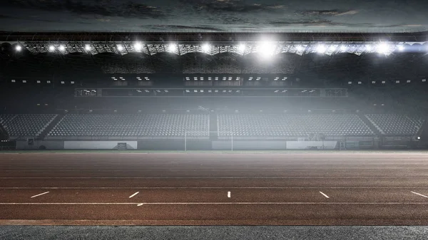 Estadio deportivo en luces. Medios mixtos —  Fotos de Stock