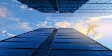 Business City 'nin üstündeki uçak. Karışık ortam