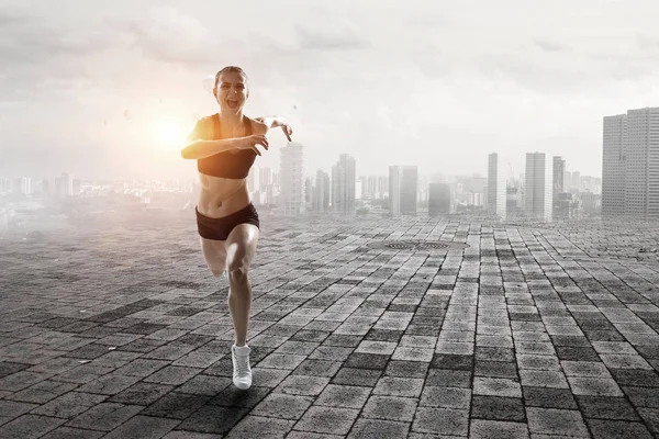 Desportista a correr. Meios mistos — Fotografia de Stock