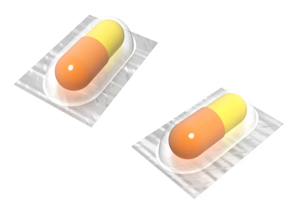 Žluté a oranžové tablety nebo kapsle — Stock fotografie