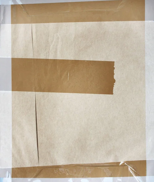 Background with paper texture and stick tape of brown color — Stock Photo, Image