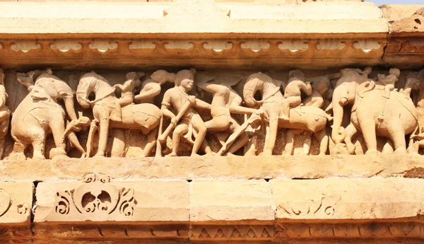 Famous human and animals sculptures at temple in Khajuraho, Indi — Stock Photo, Image