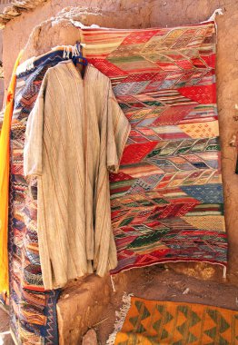 Traditional Moroccan clothing djellaba, souk Ait-Ben-Haddou Kasb