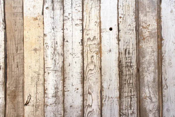 Ancient wood with cracked paint of white color — Stock Photo, Image