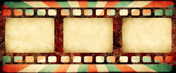 Grunge background with retro filmstrips and paper texture