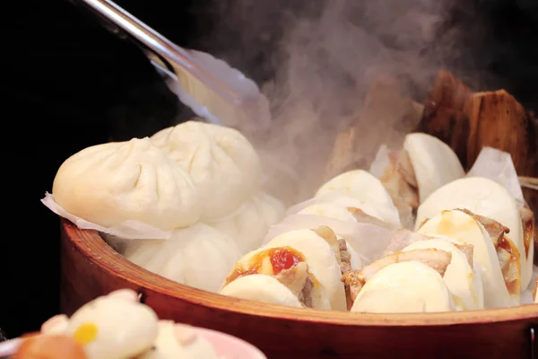 Cooking of traditional chinese fast food steamed buns