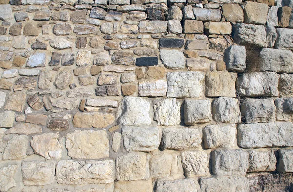 Ancient wall of stone blocks — Stock Photo, Image