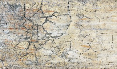 Gri, beyaz ve sarı renkli eski duvar dokusuyla Grunge arkaplanı