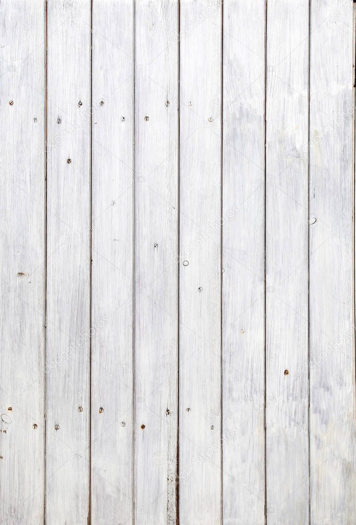 Texture of olden wood planks with paint of white color. Horizontal or vertical background with white painted boards
