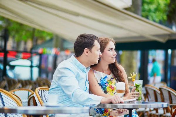 Romantic loving couple in Parisian cafe — Stock Photo, Image