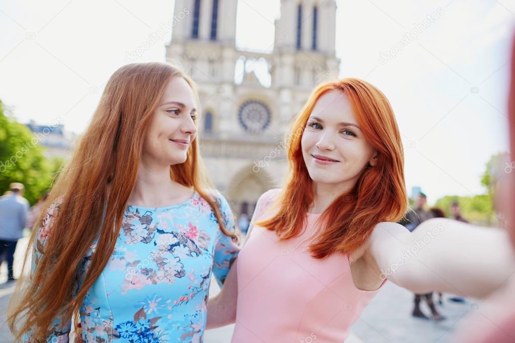 Two young girls near Notre-Dame in Paris