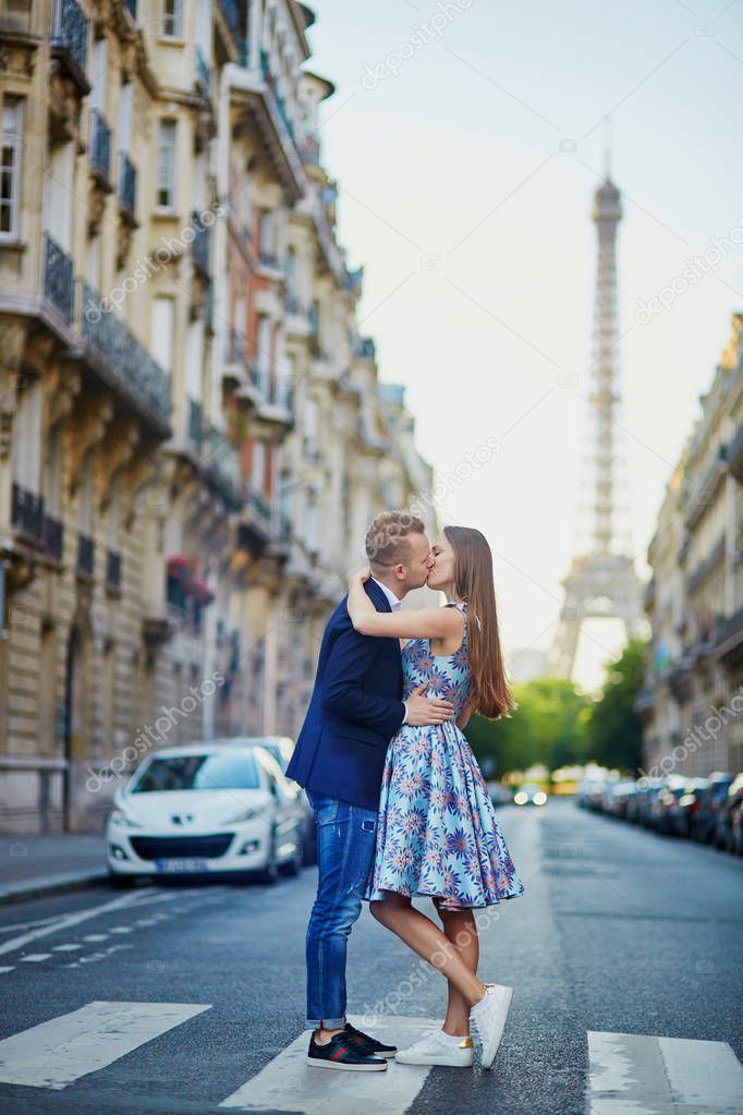 Romantic couple near the Eiffel tower in Paris