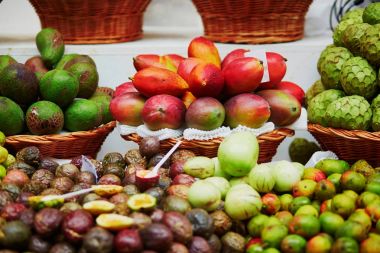 Exotic fruits on farmer market in Funchal, Madeira, Portugal clipart