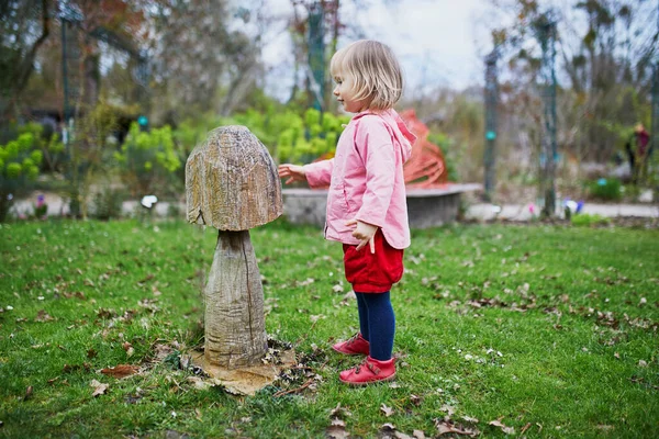 Adorable Toddler Girl Walking Park Playing Wooden Mushroom — Stock Photo, Image