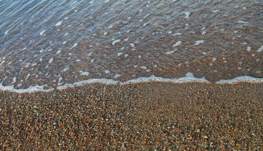 Kumlu plaj arka plan dalga yumuşak.