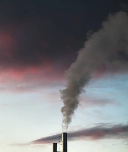 Station with smoke stacks.