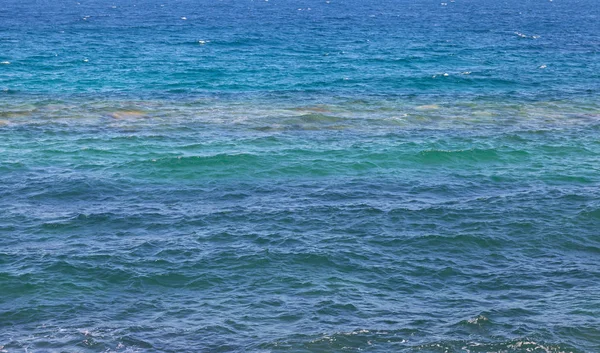 Oppervlak van blauw water. — Stockfoto