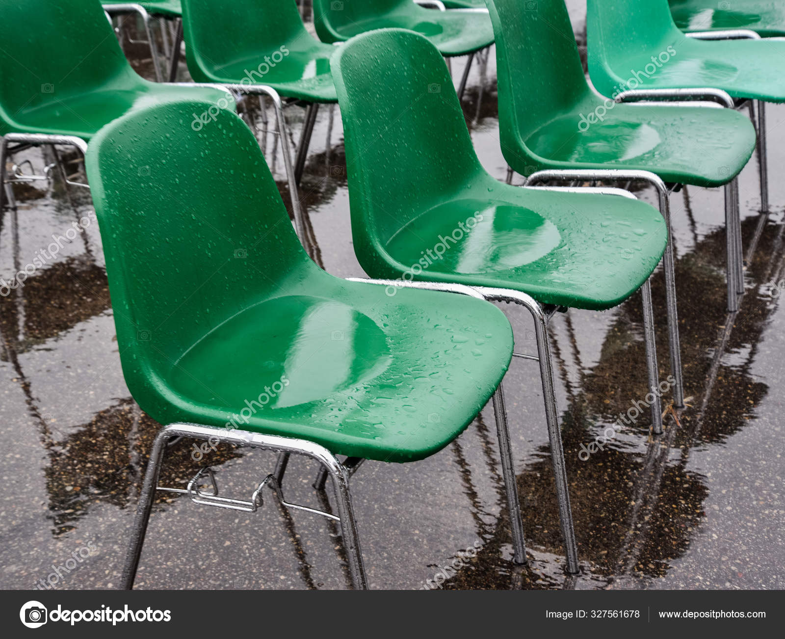 Chairs after the rain. — Stock Photo © Ratikova 327561678