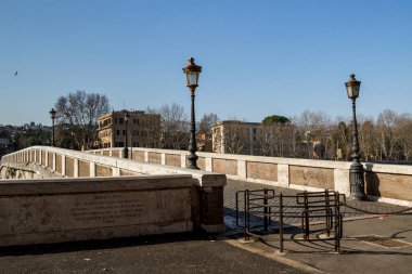 ITALY, ROMA - FEBRUARY 13: Rome is the capital city and a special comune of Italy. View to bridge above river Tiber in Roma on 13 February 2012, Roma, Italy. 