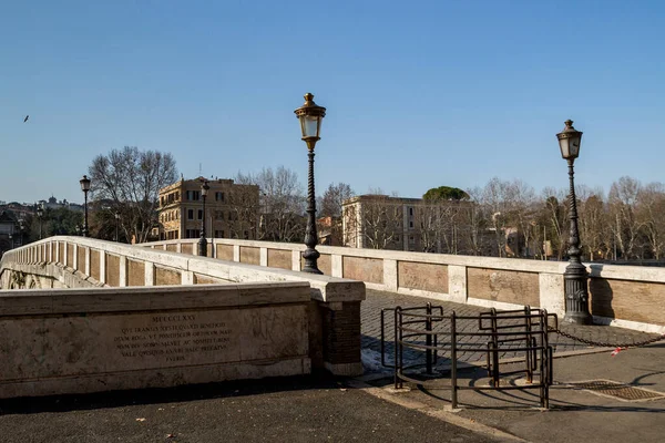 ITALY, ROMA - FEBRUARY 13: Rome is the capital city and a special comune of Italy. View to bridge above river Tiber in Roma on 13 February 2012, Roma, Italy. 