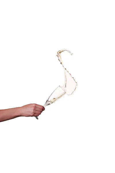 Chapoteo de champán de vidrio con mano femenina aislada —  Fotos de Stock