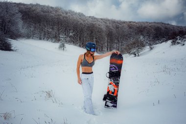 Kadın Snowboard tutun snowboard ve snowboard olacak