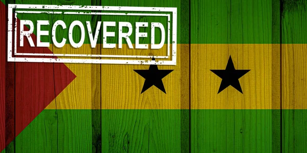 flag of Sao Tome and Principe that survived or recovered from the infections of corona virus epidemic or coronavirus. Grunge flag with stamp Recovered