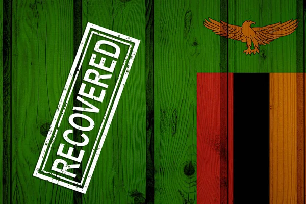 flag of Zambia that survived or recovered from the infections of corona virus epidemic or coronavirus. Grunge flag with stamp Recovered