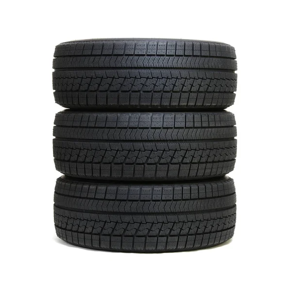 Neumáticos de coche en blanco —  Fotos de Stock