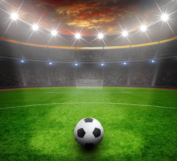 Soccer ball on green stadium — Stock Photo, Image