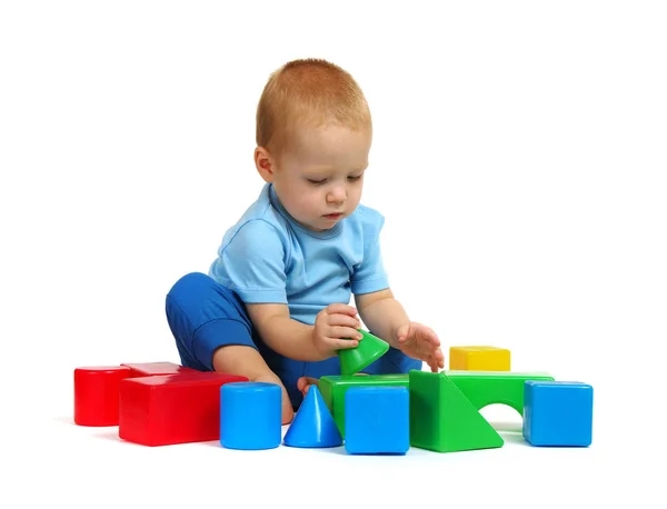 Little boy playing toy Royalty Free Stock Images