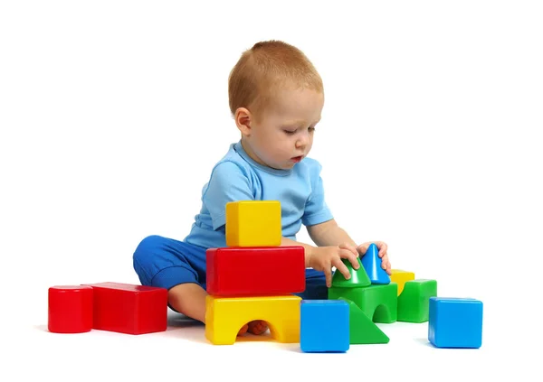 Little boy playing toy Stock Image