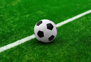 Sahada futbol topu