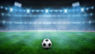 Futbol stadyumunda gras üzerinde Top 