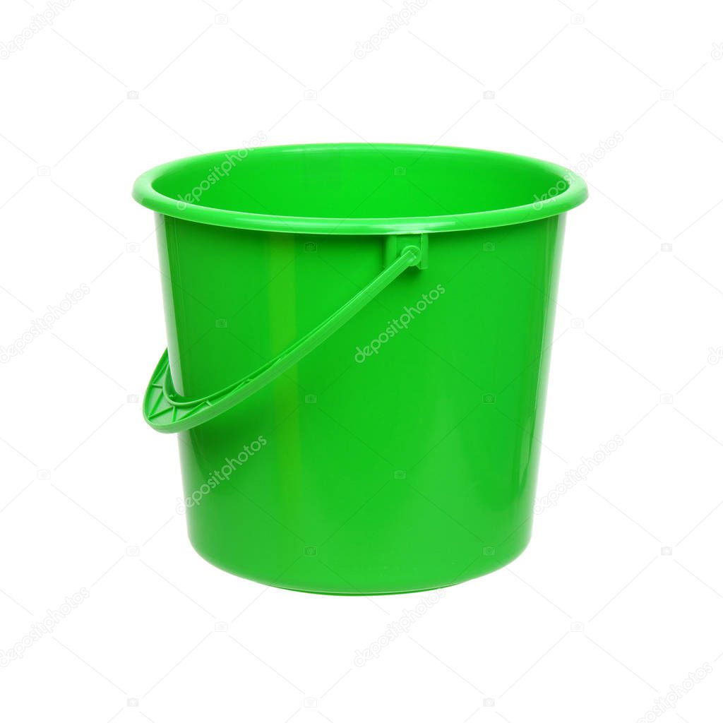 Green plastic bucket on white 