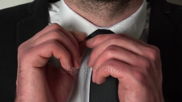 Businessman adjusting his tie — Stock Video