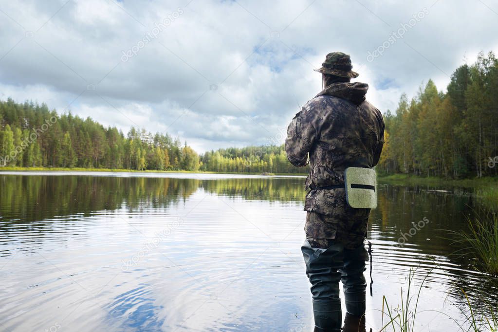 Man fishing on a lake