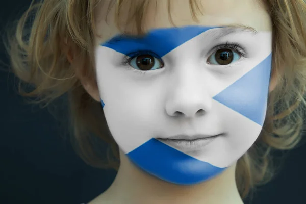 Portrait of a child with a painted Scottish flag — Stock Photo, Image