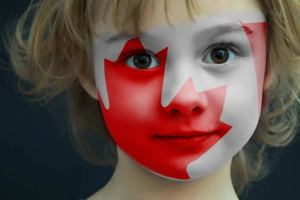 Child with a painted flag of Canada — Stock Photo, Image