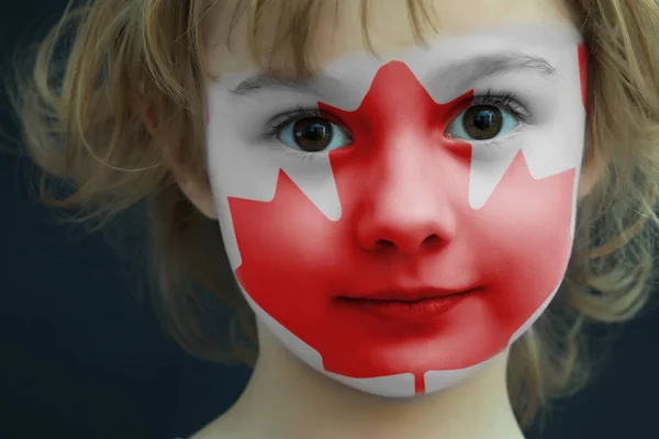 Child with a painted flag of Canada — Stock Photo, Image